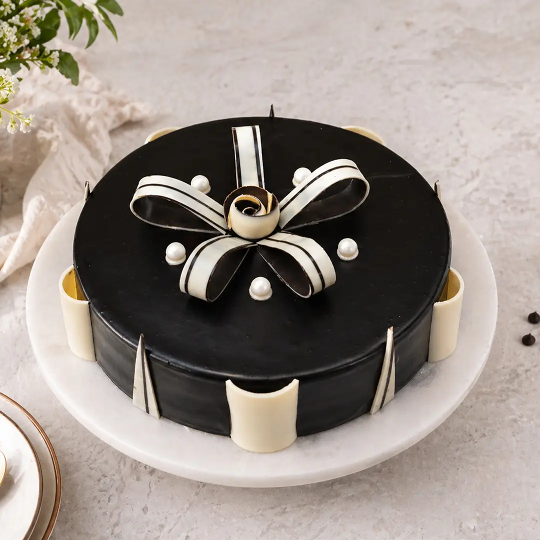 Black and white ribbon celebration cake